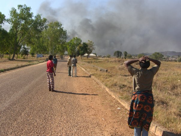 road, people, hot afternoon, burning, riot