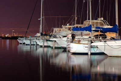 3778765-pleasure-boats-docked-at-night-in-miami-marina