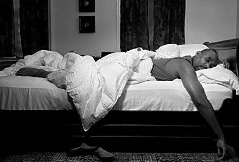 getty_rf_photo_of_man_sleeping_soundly_in_comfortable_bed1
