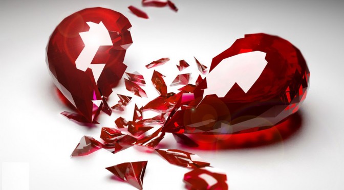 lovely-red-heart-broken-in-many-pieces